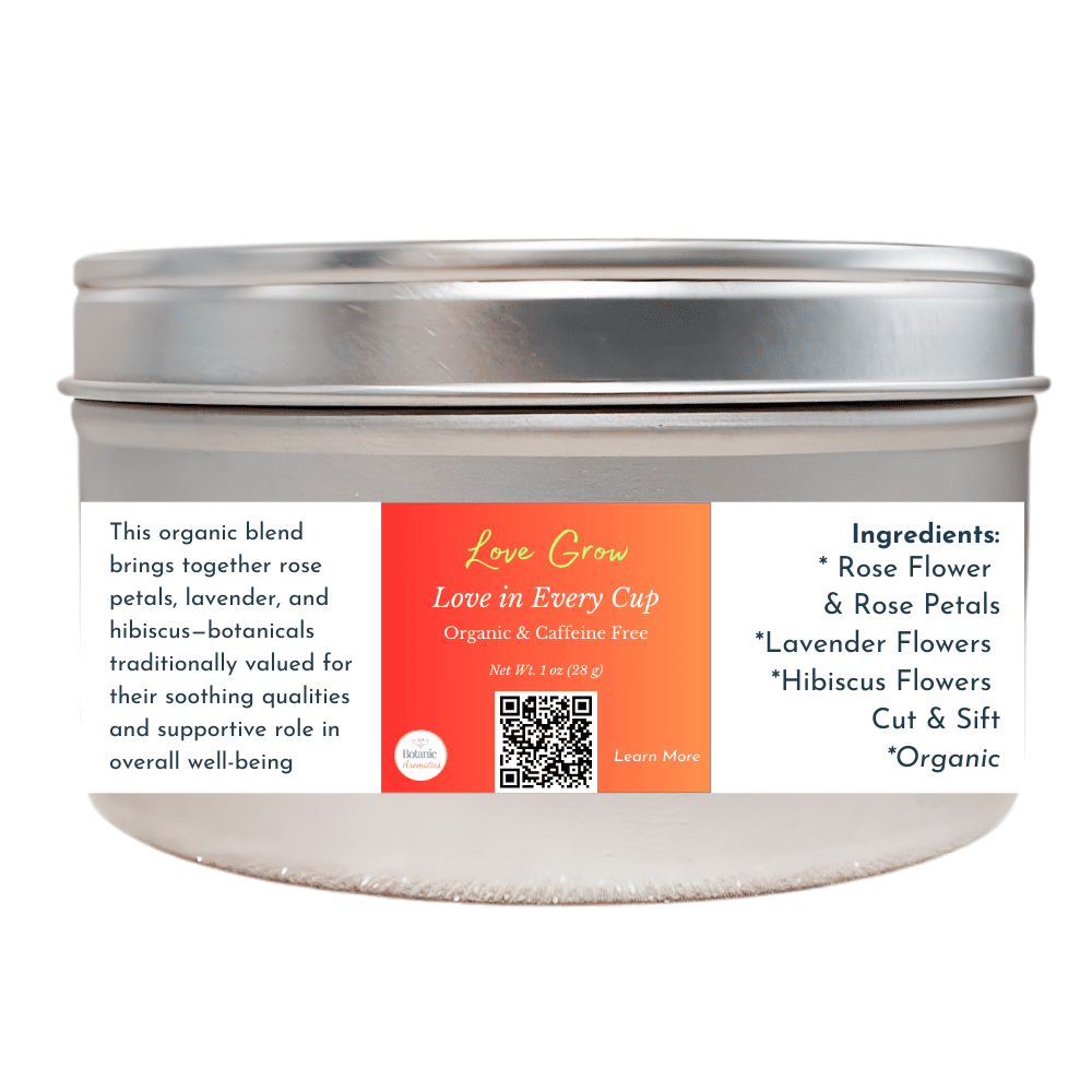 Love Grow organic herbal tea in a silver tin with a coral label, featuring rose petals, lavender, and hibiscus, crafted for soothing emotional well-being.