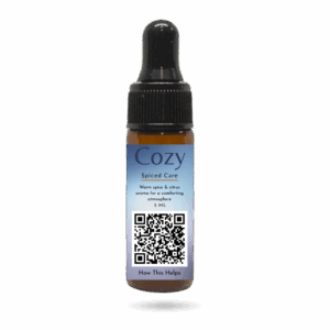 Cozy Diffusion Blend, a warming spice and citrus essential oil blend designed for intentional aromatic comfort during times of care.
